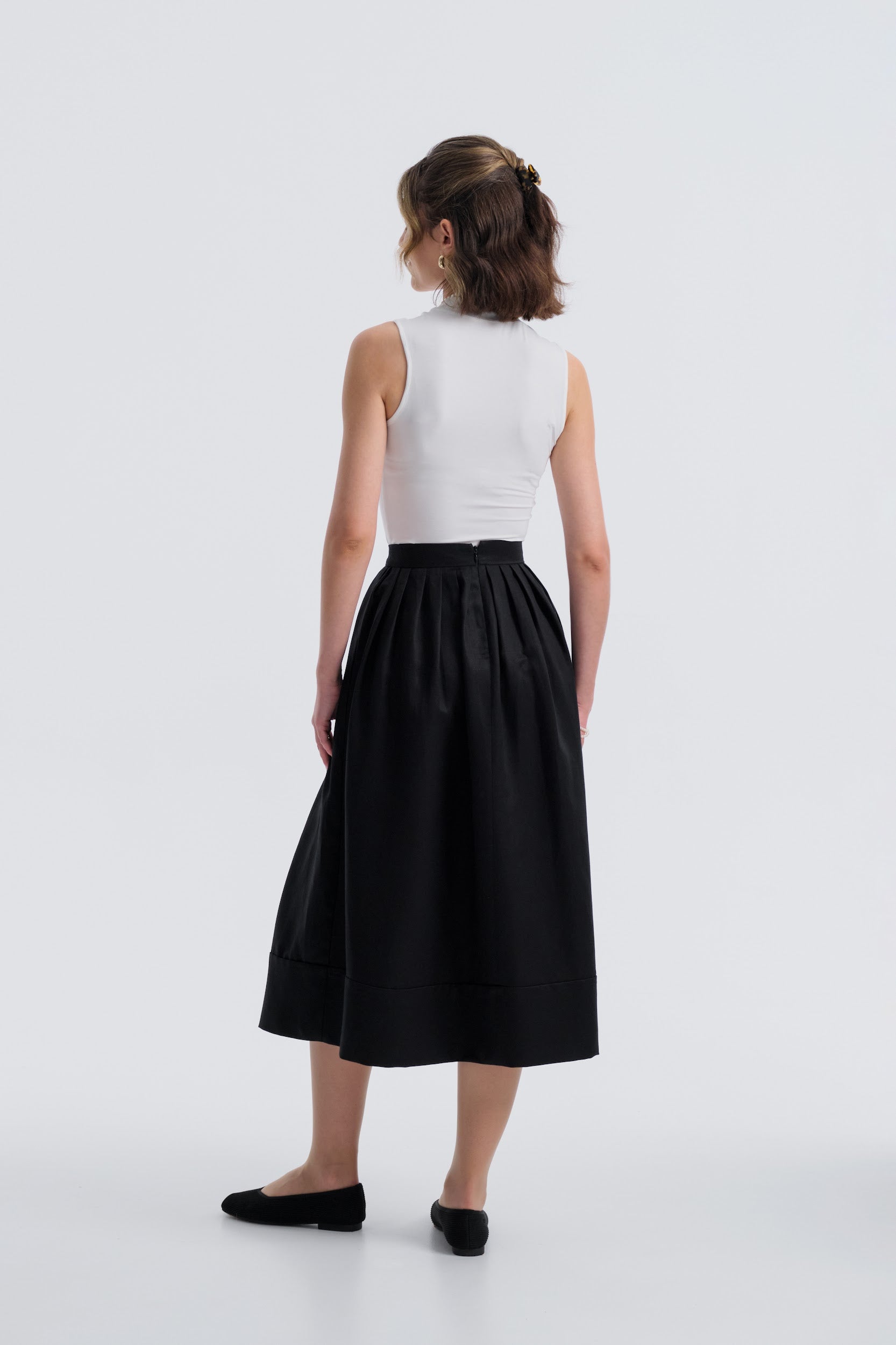 Milos Noir Midi Skirt